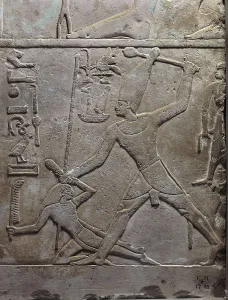 The Pharaoh Mentuhotep sacrifying a prisoner. 2061 - 2010 BC. Detail. Egyptian art. Middle Kingdom. Relief on rock. EGYPT. Cairo. Egyptian Museum
