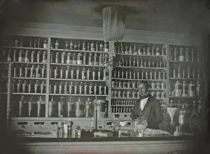Medical Prints: Pharmacist posing in his business, the S