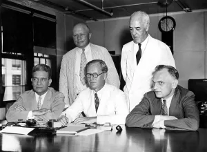 Landis Prints: Photo shows the newly created National Securities Exchange Commission --Left to right (seated)