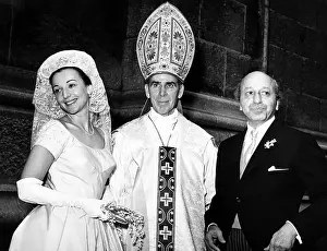 Wedding Dress Prints: Photographer Yousuf Karsh poses with his bride