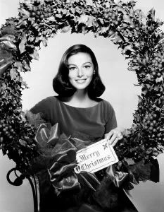 Christmas Wreath Prints: Pier Angeli with Christmas greetings, MGM publicity, circa 1958