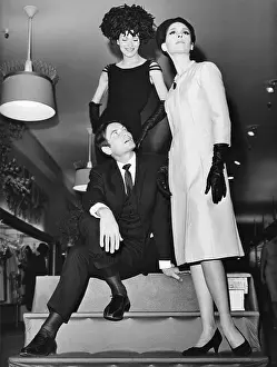 Models Prints: Pierre Cardin, Italian-born French fashion designer, with models at Bonwit Teller