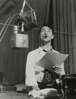 Lcgr1410 Prints: Pinto Colvig in Walt Disney studios creating sounds for an animated film in the 1930s