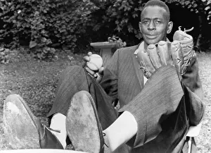 Sitting In Chair Prints: Pitcher Leroy Satchel Paige (1906-1982)