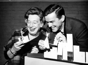 Theatre Prints: Playwright Lillian Hellman and Director Gower Champion handle the model of the set for the play My Mother