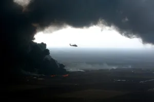 Iraq Prints: A plume of smoke surrounds a U