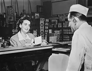 Shortages Prints: How many points will it take?, a shopper asks before she buys food during World War 2