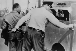 Birmingham Prints: Police officer seizing Martin Luther King by the seat of his trousers