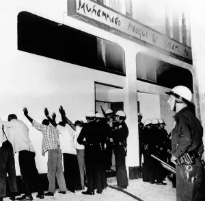Militants Prints: Police officers line up African Americans at an Black Muslim Mosque
