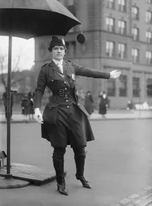 Dress Reform Prints: Policewoman directing traffic in Washington