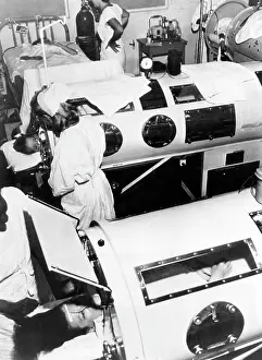 Medical Prints: Polio patients being treated with iron lungs in a hospital ward