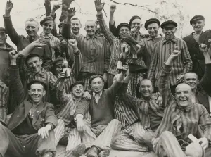 Cheers Prints: Polish prisoners toast their liberation from the Dachau concentration camp
