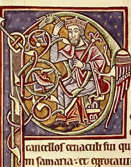 Portuguese Bible. Initial with representation of the king Ahaziah of Israel (Moab), 11th c. Romanesque art. Miniature Painting. PORTUGAL. Coimbra. Coimbra University Library