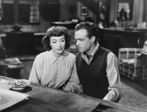 Pianist Prints: POSSESSED, from left, Joan Crawford, Van Heflin, 1947