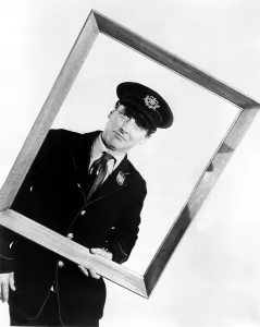 Badge Prints: POSTMAN'S KNOCK, Spike Milligan, 1962