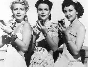 Compact Prints: KEEP YOUR POWDER DRY, from left: Lana Turner, Susan Peters, Laraine Day, 1945