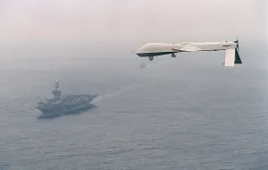 Explosives Prints: Predator Unmanned Aerial Vehicle flies above the aircraft carrier USS Carl Vinson on a Navy aerial reconnaissance test