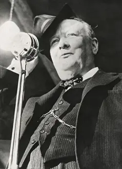 Lcgr1501 Prints: Former Premier Winston Churchill broadcasting a radio message during the British general elections