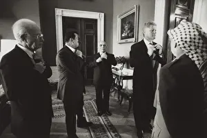 Preparing Prints: Pres. Clinton and Middle East leaders before signing to extend Palestinian rule on the West Bank
