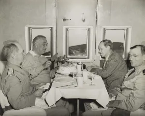 2013 Prints: Pres. Franklin Roosevelt cuts into his birthday cake aboard a plane