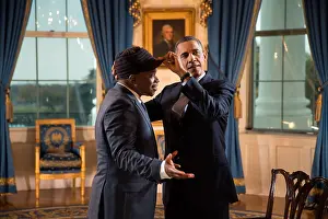 Entertainers Prints: President Barack Obama adjusts Sway Calloway's hat in the Blue Room of the White House