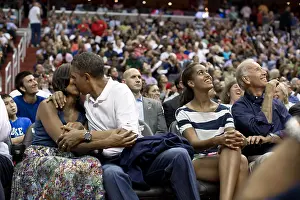 Affection Prints: President Barack Obama kisses First Lady Michelle Obama for the Kiss Cam'