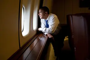 President Barack Obama looks out at the Australian landscape from Air Force One, Nov. 17, 2011. He was flying from Canberra to Darwin, Australia (BSLOC_2015_13_138)