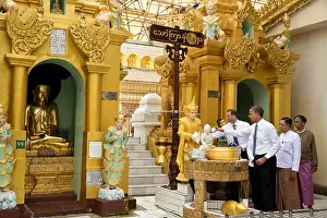 Burma Prints: President Barack Obama pours water over the left shoulder of the Friday Buddha