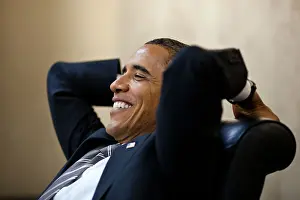 Hands Behind Head Prints: President Barack Obama has a relaxed moment in a meeting in the White House Situation Room