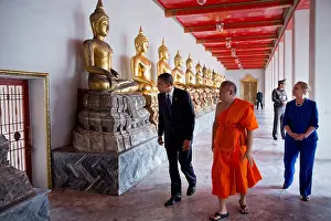 Clinton Prints: President Barack Obama and Secretary Hillary Clinton tour Wat Pho Royal Monastery