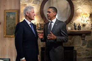 Lcgr1506 Prints: President Barack Obama talks with former President Bill Clinton