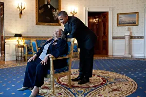 Leaning Over Prints: President Barack Obama talks with Presidential Medal of Freedom recipient Toni Morrison