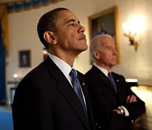 President Prints: President Barack Obama and Vice President Joe Biden await the signing ceremony for the Affordable Health Care Act
