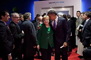 Powerful Women Prints: President Barack Obama walks with Chancellor Angela Merkel at the G20 Summit in Cannes