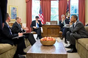 Obama Prints: President Barack Obama's senior advisors before a phone call with Russia's Vladimir Putin