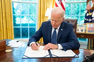 Finance Prints: President Biden signing a new law providing funds to a whistleblower award program of the Commodity Futures Trading