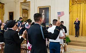 Young Adults Prints: President Biden speaks at a naturalization ceremony of essential workers and military service members
