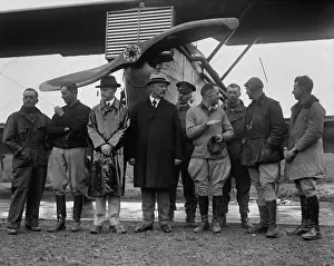 Records Prints: President Calvin Coolidge with aviators of the first-around-the-world airplane flight