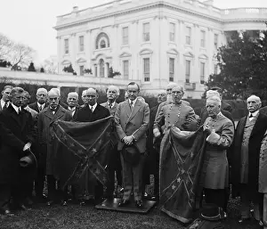 Calvin Prints: President Calvin Coolidge with Confederate group holding Star and Bars flag