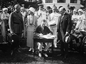 Calvin Prints: President Calvin Coolidge signing the $6