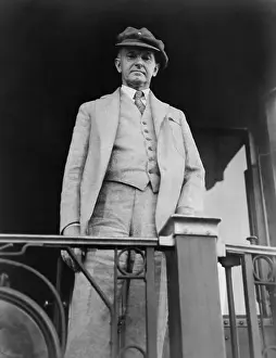Railroad Car Prints: President Calvin Coolidge, standing at rear of train car passing through Chicago in 1928