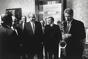 Gifts Prints: President Bill Clinton plays the saxophone presented to him by Russian President Boris Yeltsin