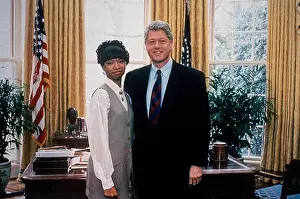 Clinton Prints: President Bill Clinton poses with PSA Costar, Alicia Brown, 1994. (BSLOC_2021_7_21)