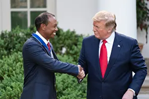 Eye Contact Prints: President Donald J. Trump presents the Presidential Medal of Freedom to golf champion Tiger Woods