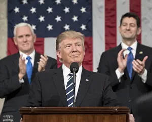 Applauding Prints: President Donald Trump delivers his first address to a joint session of Congress