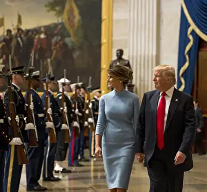 Pastel Prints: President Donald Trump and First Lady Melania Trump walk through a joint forces honor cordon