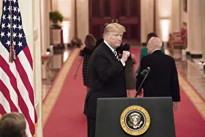 Clenched Fist Prints: President Donald Trump gestures with a fist pump at the conclusion of the swearing-in ceremony for Supreme Court