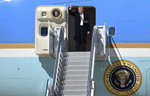 Populists Prints: President Donald Trump gives a clenched fist salute from Air Force One, March 2, 2017