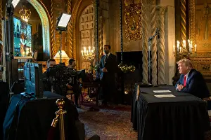 Communication Prints: President Donald Trump makes a Christmas Day video teleconference call to on duty military from the Mar-a-Lago mansion