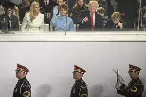 Guards Prints: President Donald Trump and members of his family watch the inaugural parade, Jan. 20, 2017